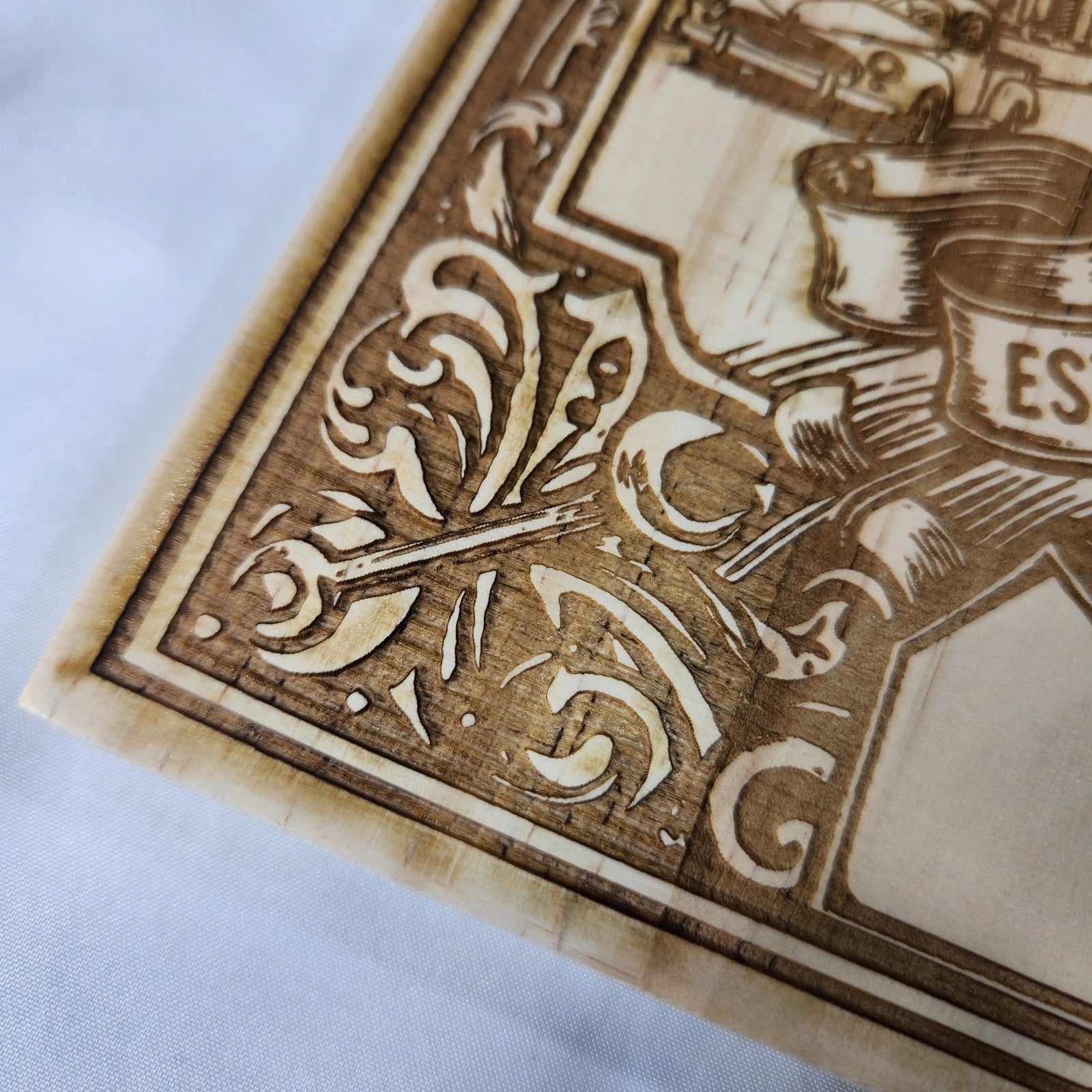Close-up of Route 66 wood laser-engraved design