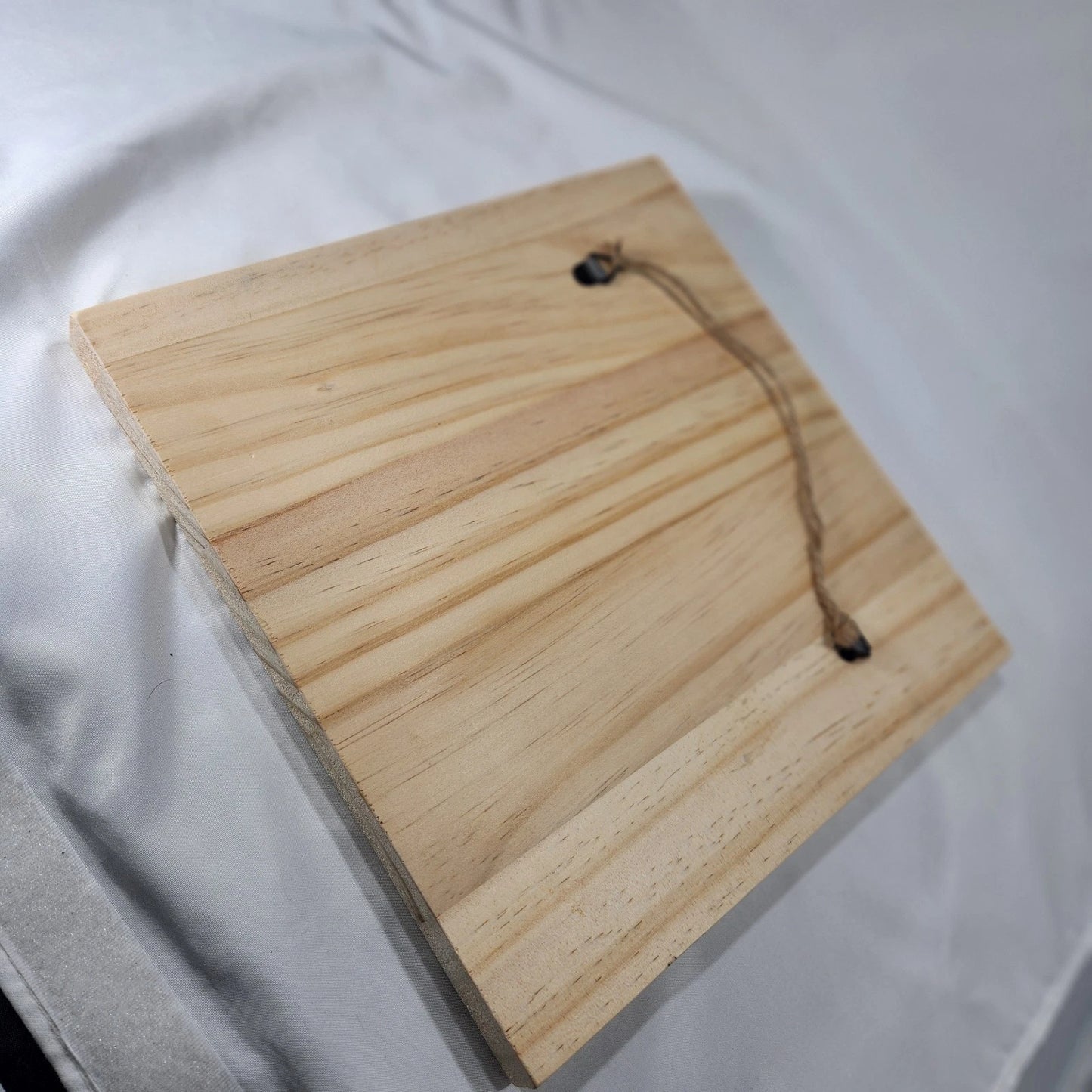 Close-up of Route 66 wood laser-engraved design backside