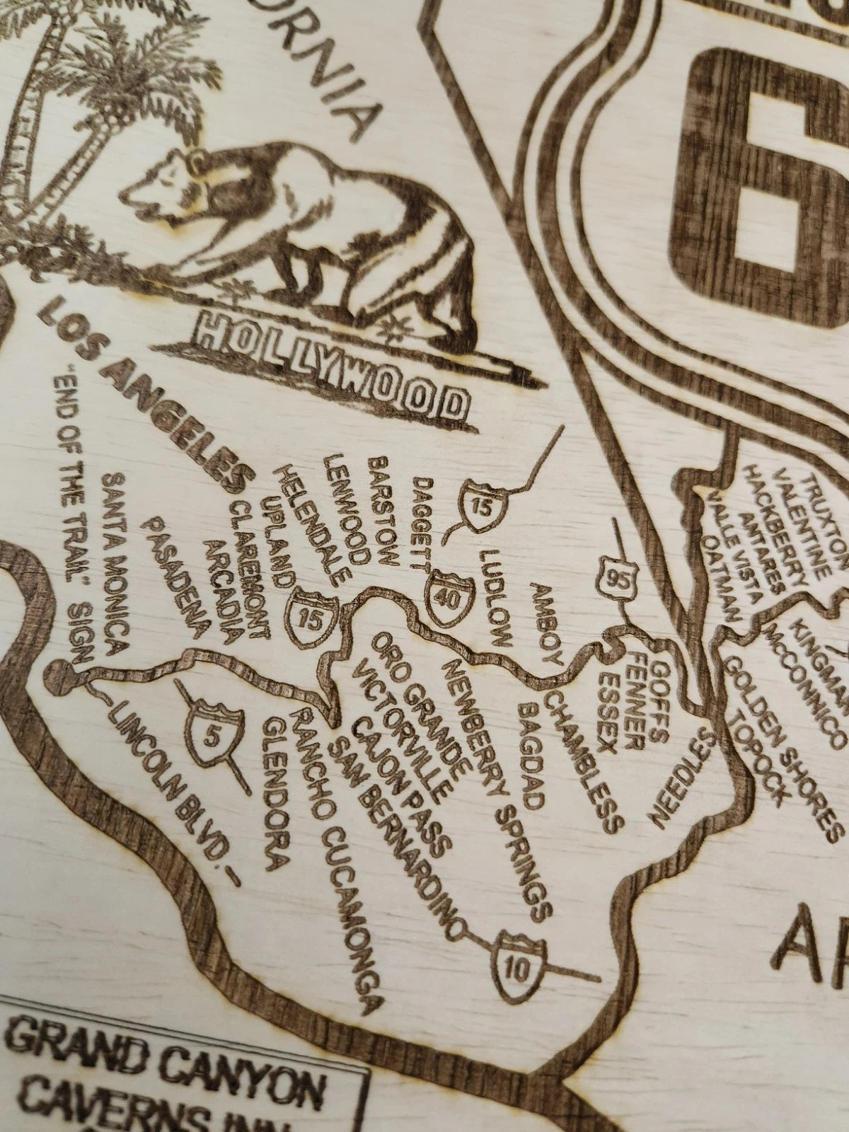 Close-up shot of California map with laser-cut details and engraved text