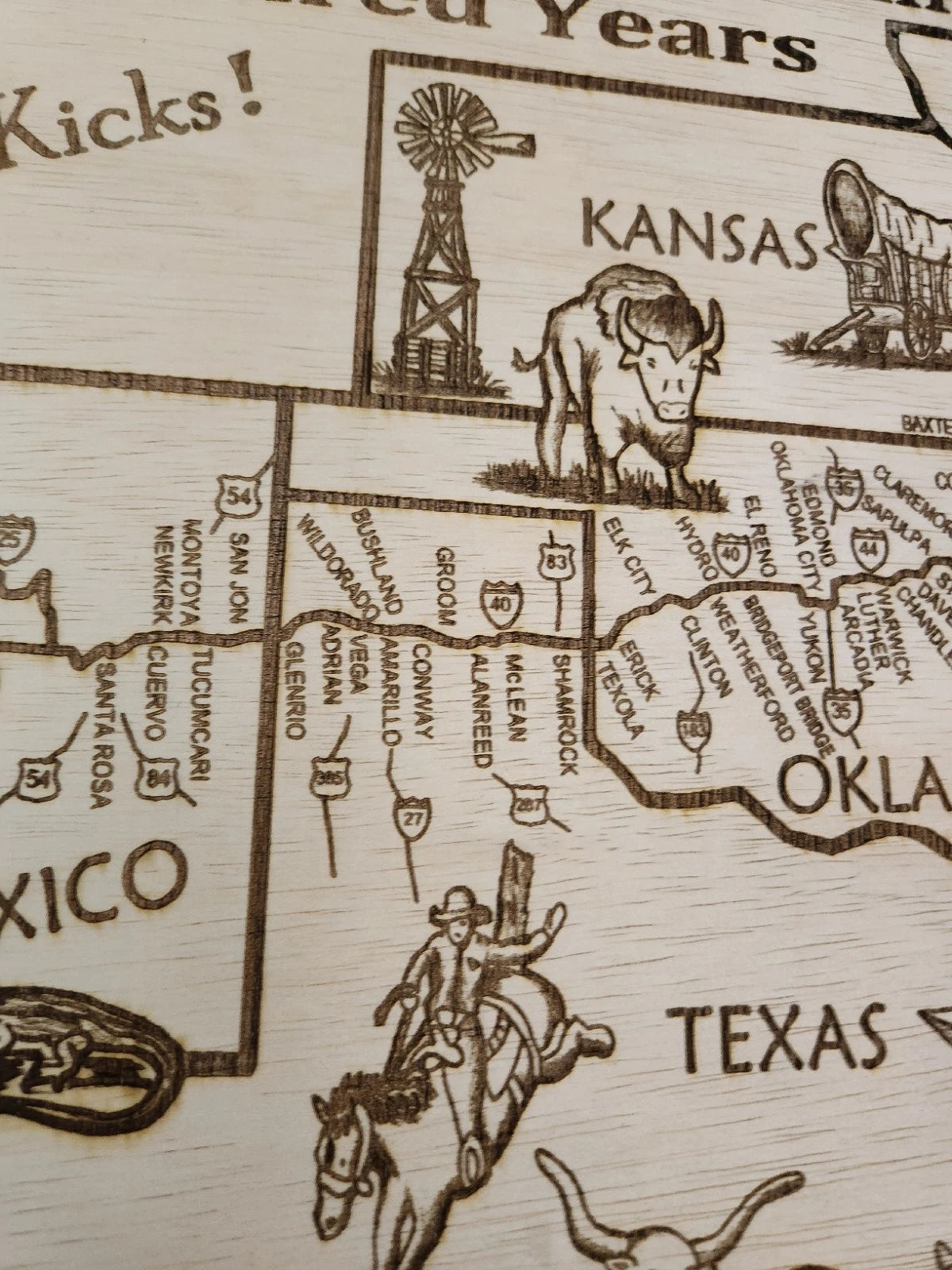 Close-up shot of Texas map with laser-cut details and engraved text