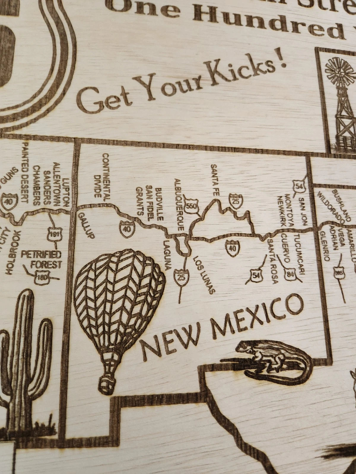 Close-up shot of New Mexico map with laser-cut details and engraved text